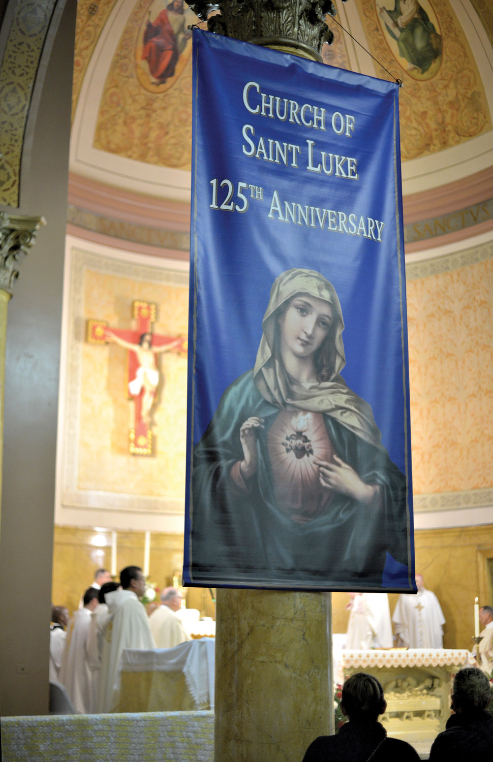 A celebration banner hangs high inside the church.